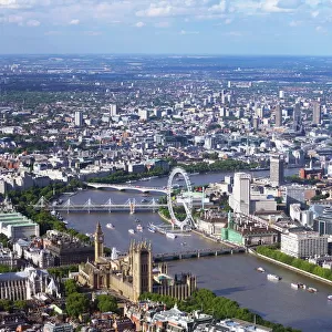 Aerial view of the Houses of Parliament, Westminster Abbey, London Eye and River Thames, London, England, United Kingdom, Europe