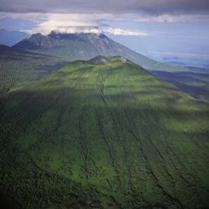 Aerial view of Mount Visoke (Mount Bisoke), an extinct volcano, straddling border of Rwanda