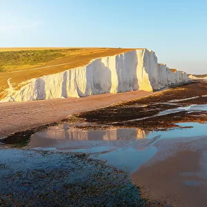 Aerial view of Seven Sisters chalk cliffs at sunset, South Downs National Park, East Sussex, England, United Kingdom, Europe
