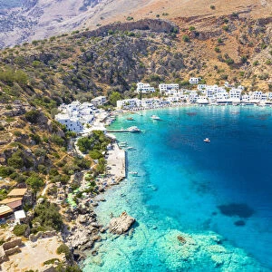 Aerial view of traditional whitewashed buildings of Loutro village and transparent sea, Crete island, Greek Islands, Greece, Europe