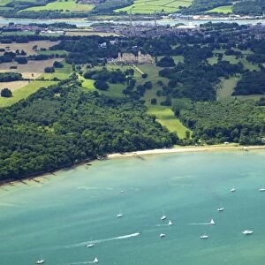 Aerial view of yachts racing in Cowes Week on the Solent, with Osborne House in background, Isle of Wight, England, United Kingdom, Europe