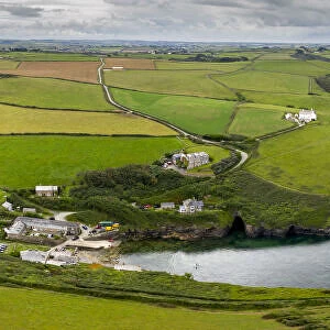 Aerial vista of Port Quin on the North Cornish coast in summer, Cornwall, England