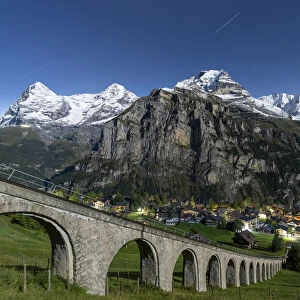 Alpine village of Murren and funicular railway lit by star trail, Lauterbrunnen
