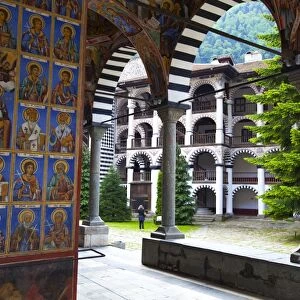 Arcade murals depicting religious figures, Church of the Nativity, Rila Monastery