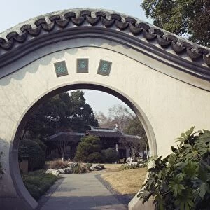 An arch looking into Winding Garden at West Lake, Hangzhou, Zhejiang Province