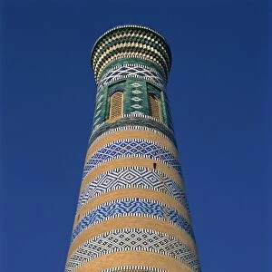 Architectural details of bricks and tiles on the Islom-Huja minaret in Khiva