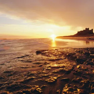 Bamburgh Castle at sunrise, Northumberland, England