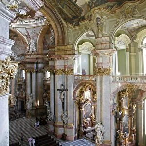 The Baroque interior of St. Nicholas Church in Mala Strana, Prague, Czech Republic