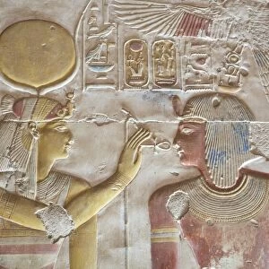 Bas-relief of Pharaoh Seti I on right with the Goddess Hathor on left, Temple of Seti I