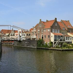 Bascule Bridge (Draw Bridge) and houses in the port of Enkhuizen, North Holland, Netherlands, Europe