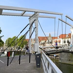 Bascule Bridge (Draw Bridge) and houses in the port of Enkhuizen, North Holland, Netherlands, Europe