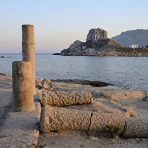 Basilica of Agios Stefanos ruins with Kastri islet and Chapel of St