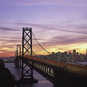 The Bay Bridge, and city skyline in the background, San Francisco, California