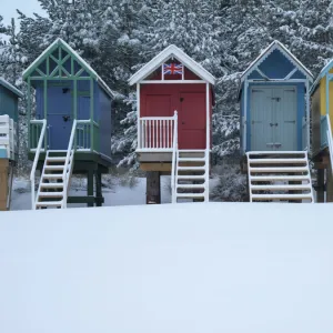 Beach huts in the snow at Wells next the Sea, Norfolk, England