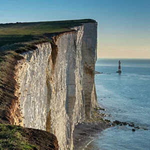 Beachy Head Lighthouse and the white chalk cliffs of Beachy Head, South Downs National Park, East Sussex, England, United Kingdom, Europe