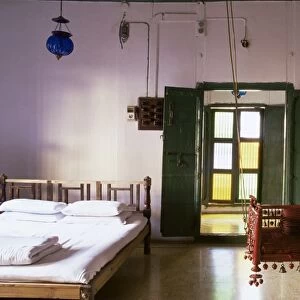 Bedroom with traditional hitchkar suspended swing seat