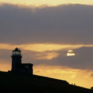 Belle Tout lighthouse on cliffs at sunset, near Birling Gap, East Sussex, England, United Kingdom, Europe