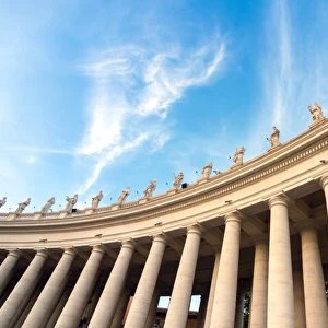 Berninis 17th century colonnade and statues of saints, St. Peters Square, Vatican City