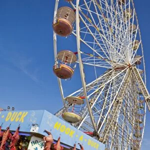 Big wheel and prize stall on the Central Pier, Blackpool, Lancashire, England