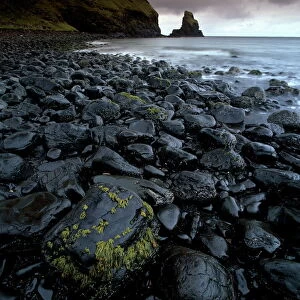 Black boulder rocks in Talisker Bay