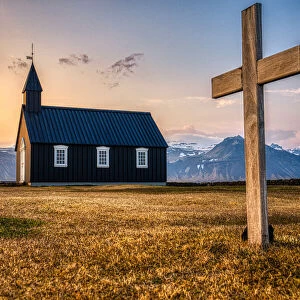 A black church known as Buoakirkja, in the Snaefellsnes peninsula at sunset, Budir, Iceland, Polar Regions