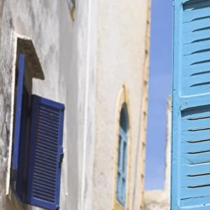 Blue shuttered windows on houses in Medina, Essaouira, Morocco, North Africa, Africa