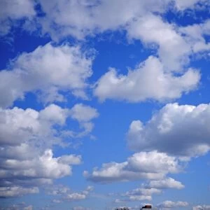 Blue sky and puffy white clouds
