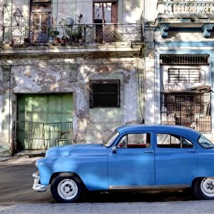 Blue vintage American car parked on a street in Havana Centro, Havana, Cuba, West Indies, Central America