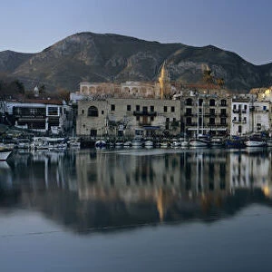 The boat filled harbour and mountains with mirror reflection, Kyrenia (Girne)