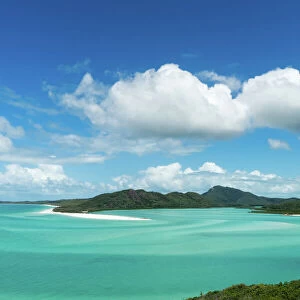 A boat in the shallow water of Whitsunday Island in tropical Queensland, Australia