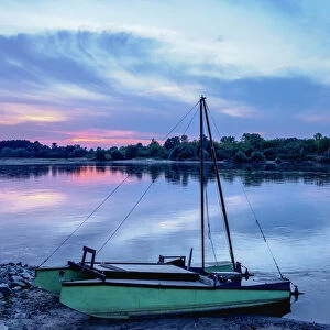 Boat and Vistula River at sunset, Mecmierz near Kazimierz Dolny, Lublin Voivodeship