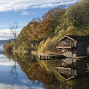 Boathouse and reflections, Lake Ullswater, Lake District National Park, Cumbria, England