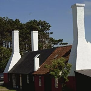 Bornholm smokehouse chimneys, where herrings are smoked, at Allinge, Bornholm
