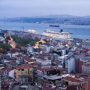 Bosphorus Strait and cruise ship at night seen from Galata Tower, Istanbul, Turkey