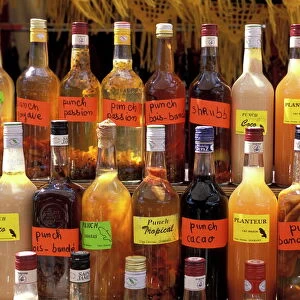 Bottles of local rum drinks at Le Diamant village