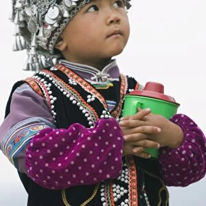 A boy dressed in Hani minority traditional clothing, Yuanyang, Yunnan Province