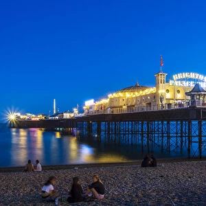Brighton Palace Pier and beach at night, East Sussex, England, United Kingdom, Europe