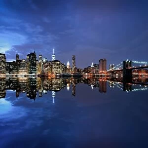 Brooklyn Bridge and Manhattan skyline at dusk, New York City, New York, United States of America