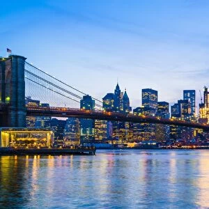 Brooklyn Bridge and Manhattan skyline at sunset, New York City, New York, United States of America