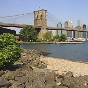 Brooklyn Bridge spanning the East River and Lower Manhattan skyline, from Empire-Fulton Ferry State Park, Brooklyn, New York City, New York, United States of America