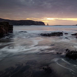 Am Buachaille sea stack at sunset, Sandwood Bay, Sutherland, Scotland, United Kingdom