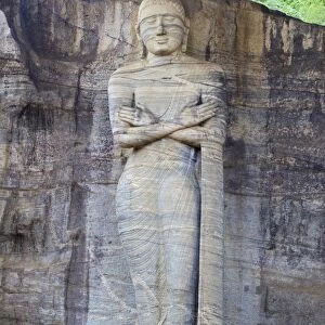 Buddha standing on lotus plinth in blessing posture, Gal Vihara Rock Temple, Polonnaruwa, Sri Lanka, Asia