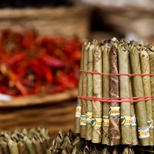 Bundles of Burmese cigars, known locally as cheroot, for sale from a hill tribe vendor at the weekly market, Kalaw, Shan State