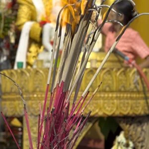 Burning incense, Shwedagon Paya, Yangon (Rangoon), Myanmar (Burma), Asia