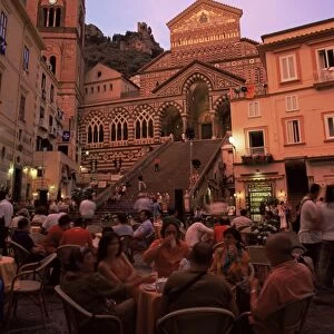 Cafe and cathedral at dusk