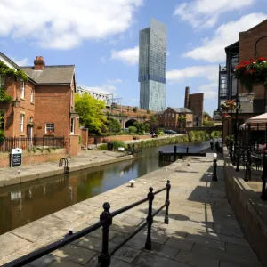 Canal and lock keepers cottage at Castlefield with the Beetham Tower in the background