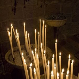 Candles in church, Southern France, Europe