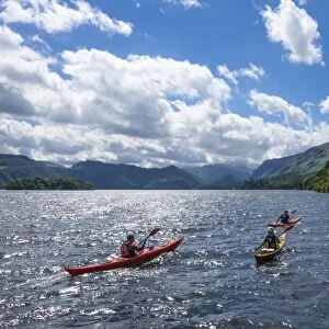 Canoes on Derwentwater, view towards Borrowdale Valley, Keswick, Lake District National Park