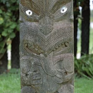 Carved wooden panel at a Maori marae or meeting house