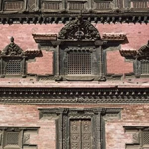 Carved wooden windows of the 55 Window Palace on Durbar
